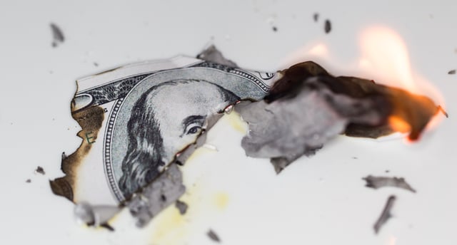 Burning Money Kraked.jpeg